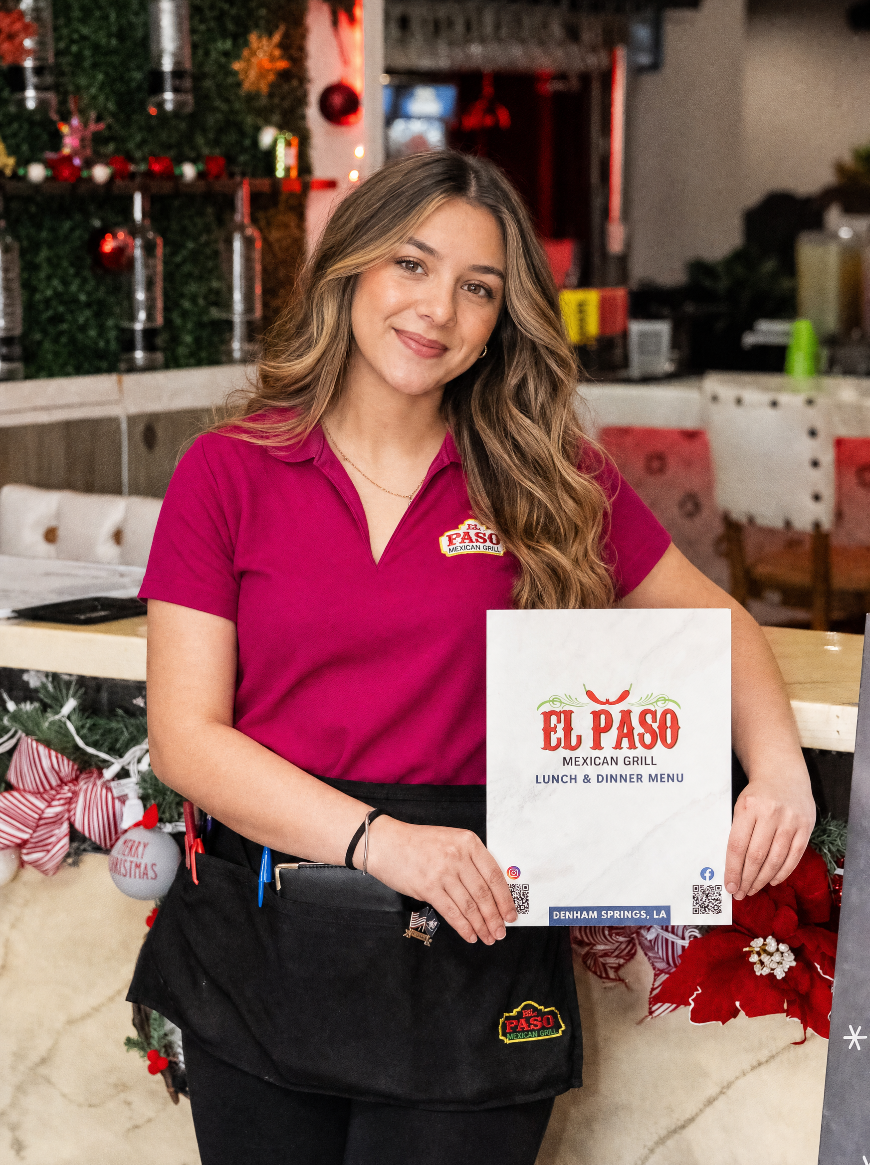 El Paso team member with the menu